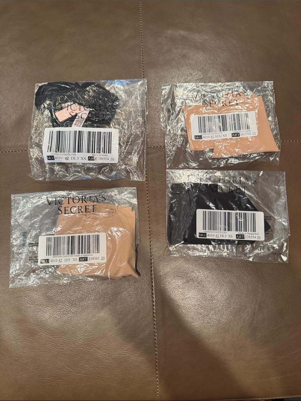 Victoria's Secret Women's Thong Panties 4-Pack in Black & Nude